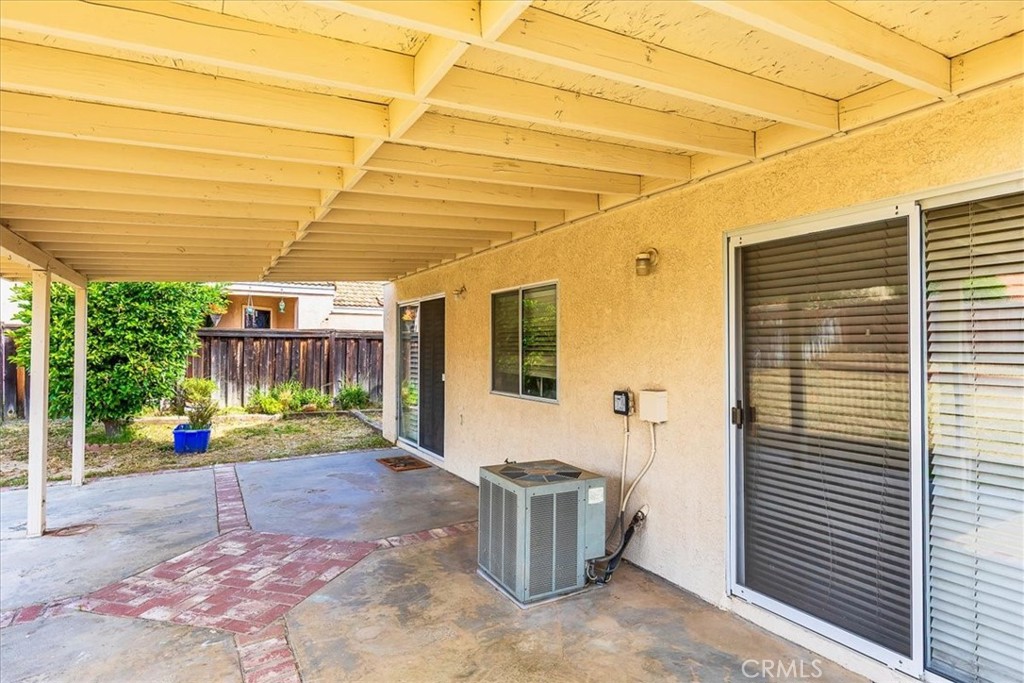 43115 Corte Landeros Temecula, CA 92592 - Photo 25 of 42 a view of a patio with table and chairs and potted plants