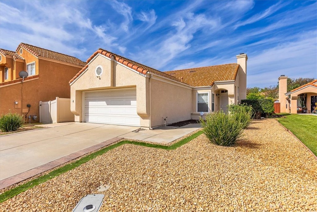 43115 Corte Landeros Temecula, CA 92592 - Photo 3 of 42 a front view of a house with a yard