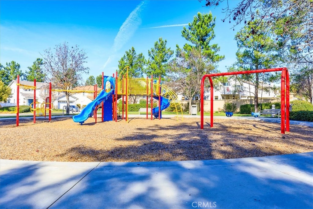 43115 Corte Landeros Temecula, CA 92592 - Photo 34 of 42 a view of a park with swings and slides