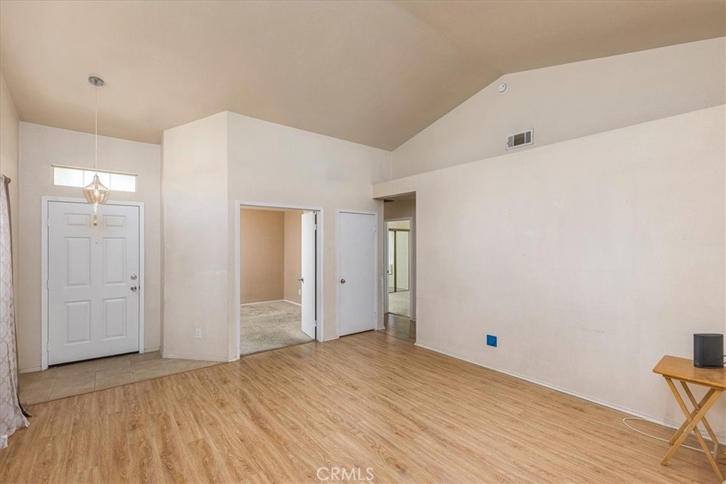43115 Corte Landeros Temecula, CA 92592 - Photo 5 of 42 a view of empty room with wooden floor