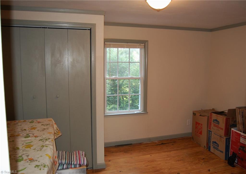 1395 Smothers Road Madison, NC 27025 - Photo 15 of 25 Bedroom number 3 with a generous closest.