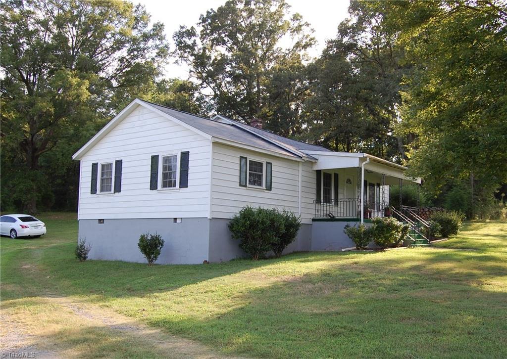 1395 Smothers Road Madison, NC 27025 - Photo 3 of 25 Front and side view of this wonderful home.