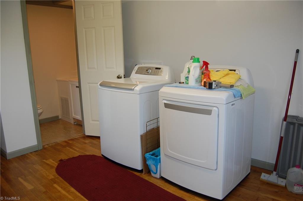 1395 Smothers Road Madison, NC 27025 - Photo 25 of 25 Large laundry room with access to the 1/2 bath. The laundry has been plumbed for a laundry sink. This room could be divided and used as a master closet and master bathroom.