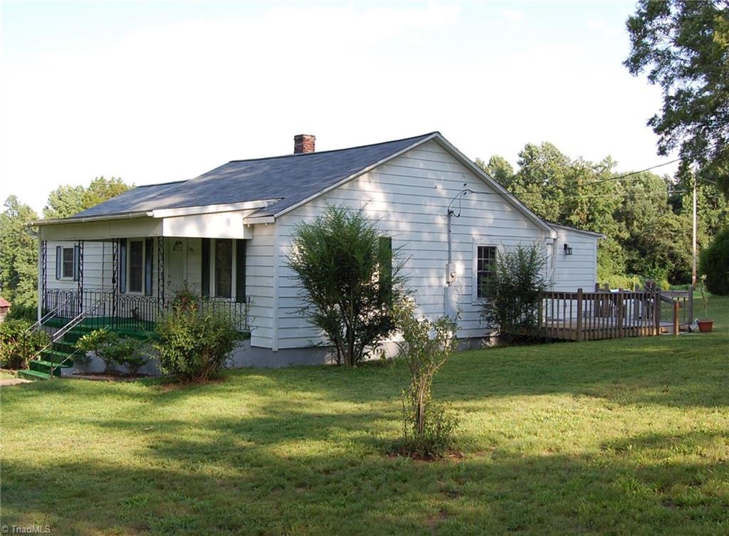 1395 Smothers Road Madison, NC 27025 - Photo 8 of 25 Front and side view of the home.