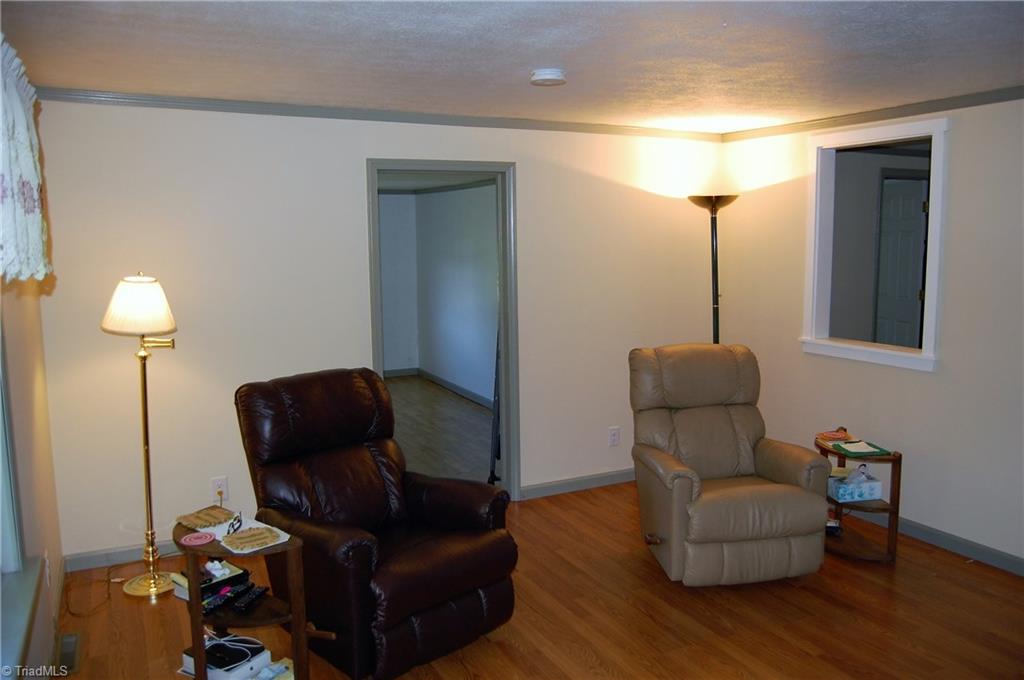 1395 Smothers Road Madison, NC 27025 - Photo 10 of 25 Second view of the living room.
