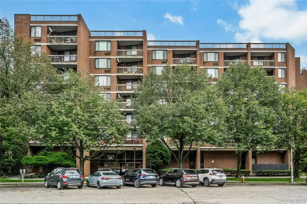 a view of a car parked in front of a building