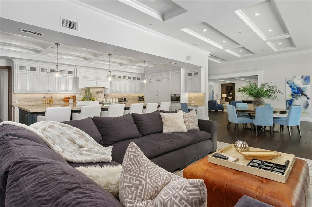 4 Inverness Lane Newport Beach, CA 92660 - Photo 13 of 56 a living room with furniture and a table