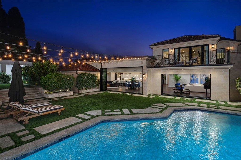 4 Inverness Lane Newport Beach, CA 92660 - Photo 2 of 56 a view of a house with pool yard and sitting area