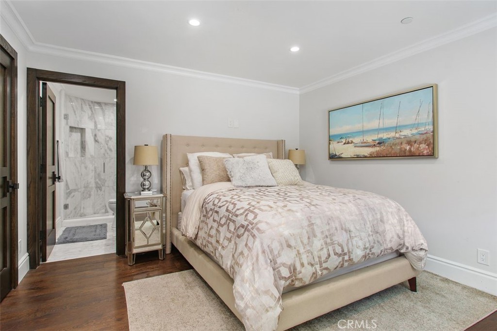 4 Inverness Lane Newport Beach, CA 92660 - Photo 26 of 56 a bedroom with a large bed and a painting