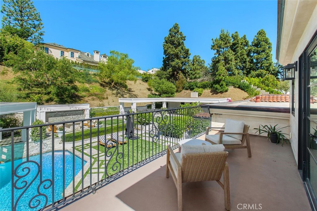 4 Inverness Lane Newport Beach, CA 92660 - Photo 37 of 56 a view of a chairs and table in patio