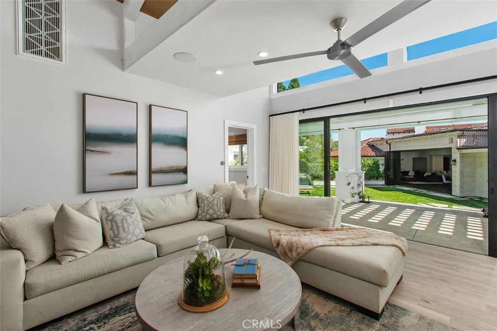 4 Inverness Lane Newport Beach, CA 92660 - Photo 49 of 56 a living room with furniture and a large window