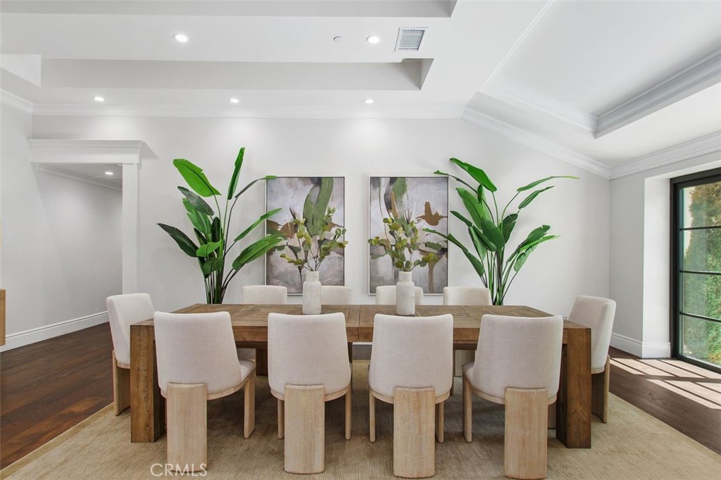 4 Inverness Lane Newport Beach, CA 92660 - Photo 8 of 56 a dining room with furniture and a potted plant