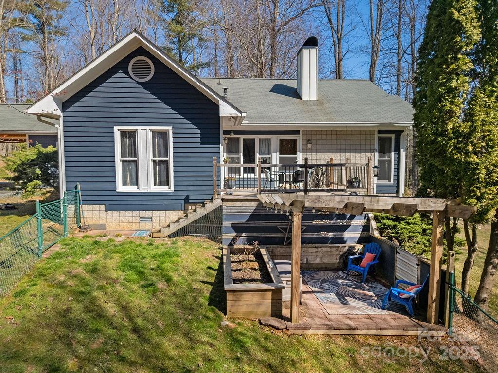 1881 Becky Mountain Road Brevard, NC 28712 - Photo 32 of 40 a view of a house with patio