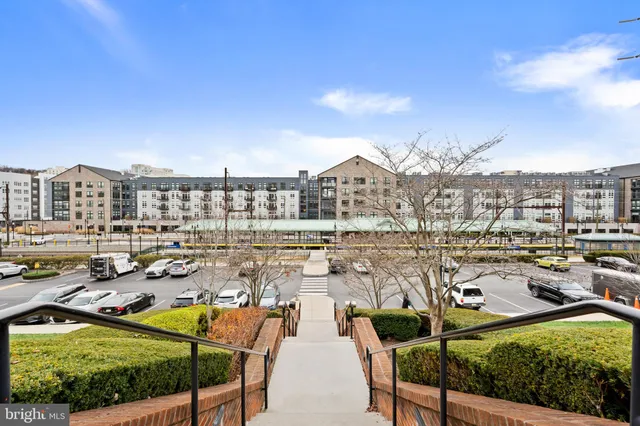 a view of a city with lawn chairs
