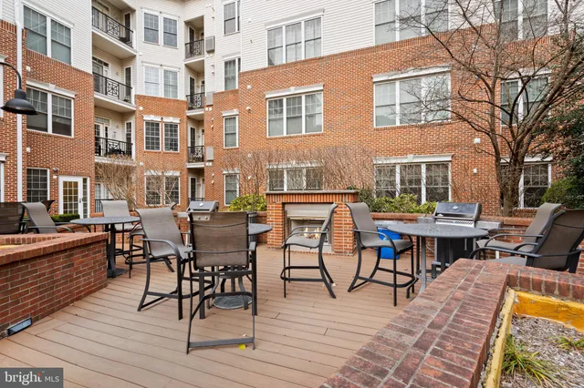 a view of a building with outdoor seating