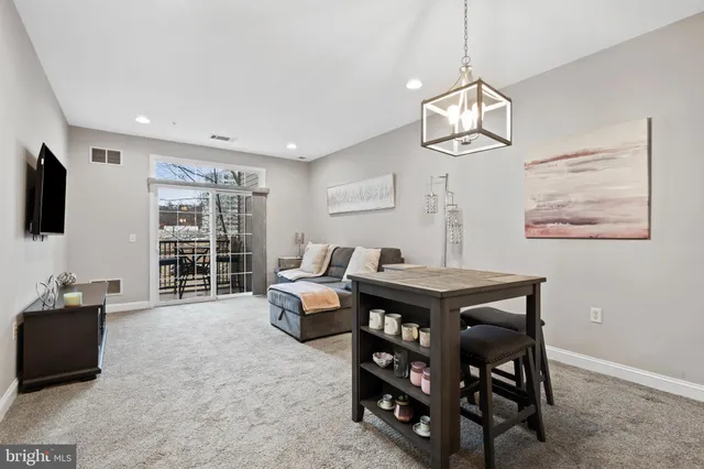 a view of a livingroom with furniture window and outside view