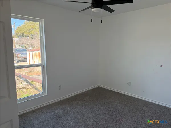 an empty room with a window