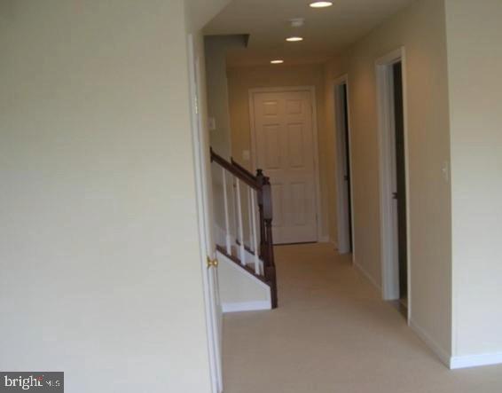 73 Spoon Square Front Royal, VA 22630 - Photo 17 of 28 a view of a hallway with staircase