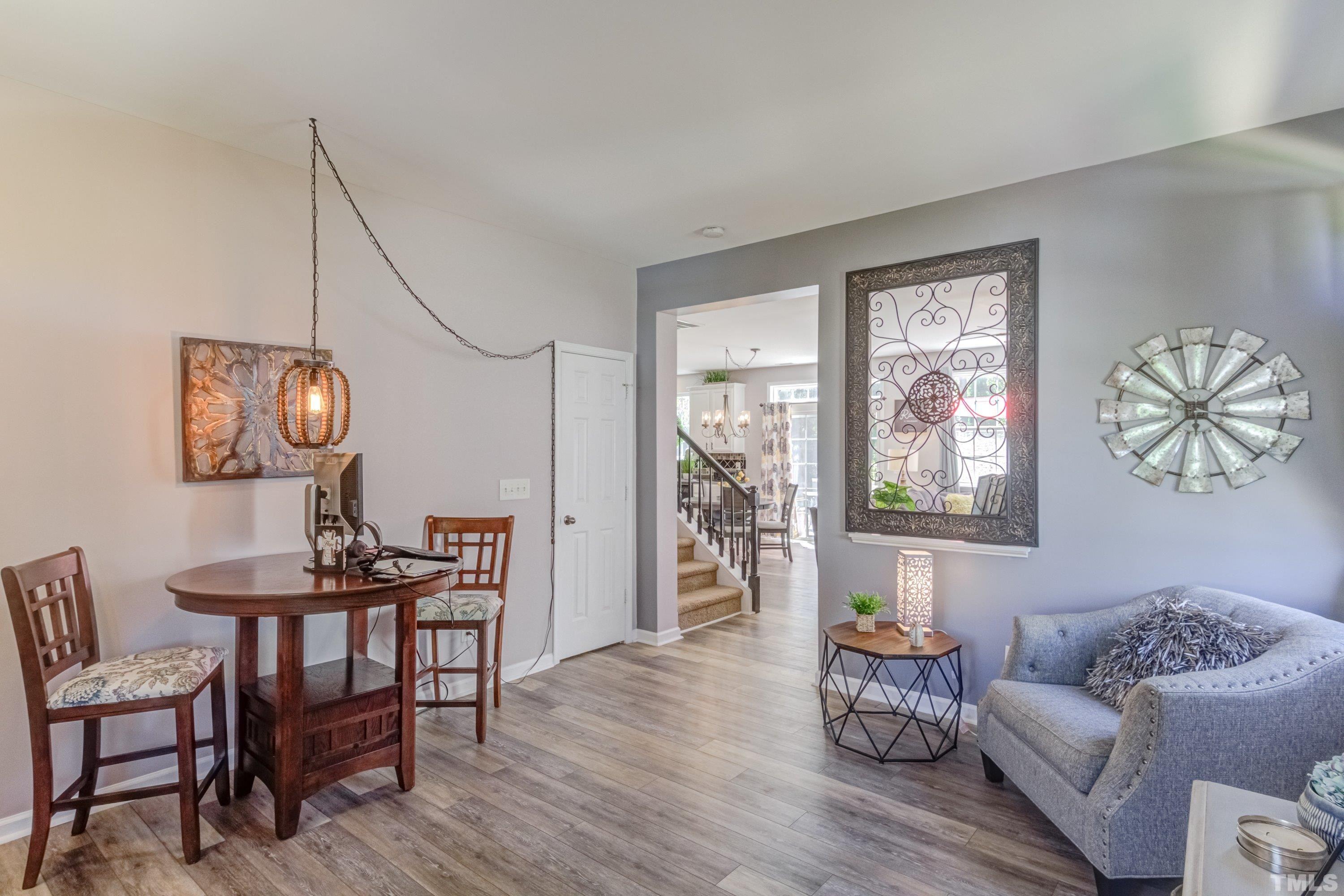 121 Ryder Cup Circle Raleigh, NC 27603 - Photo 3 of 43 a view of a livingroom with furniture and window