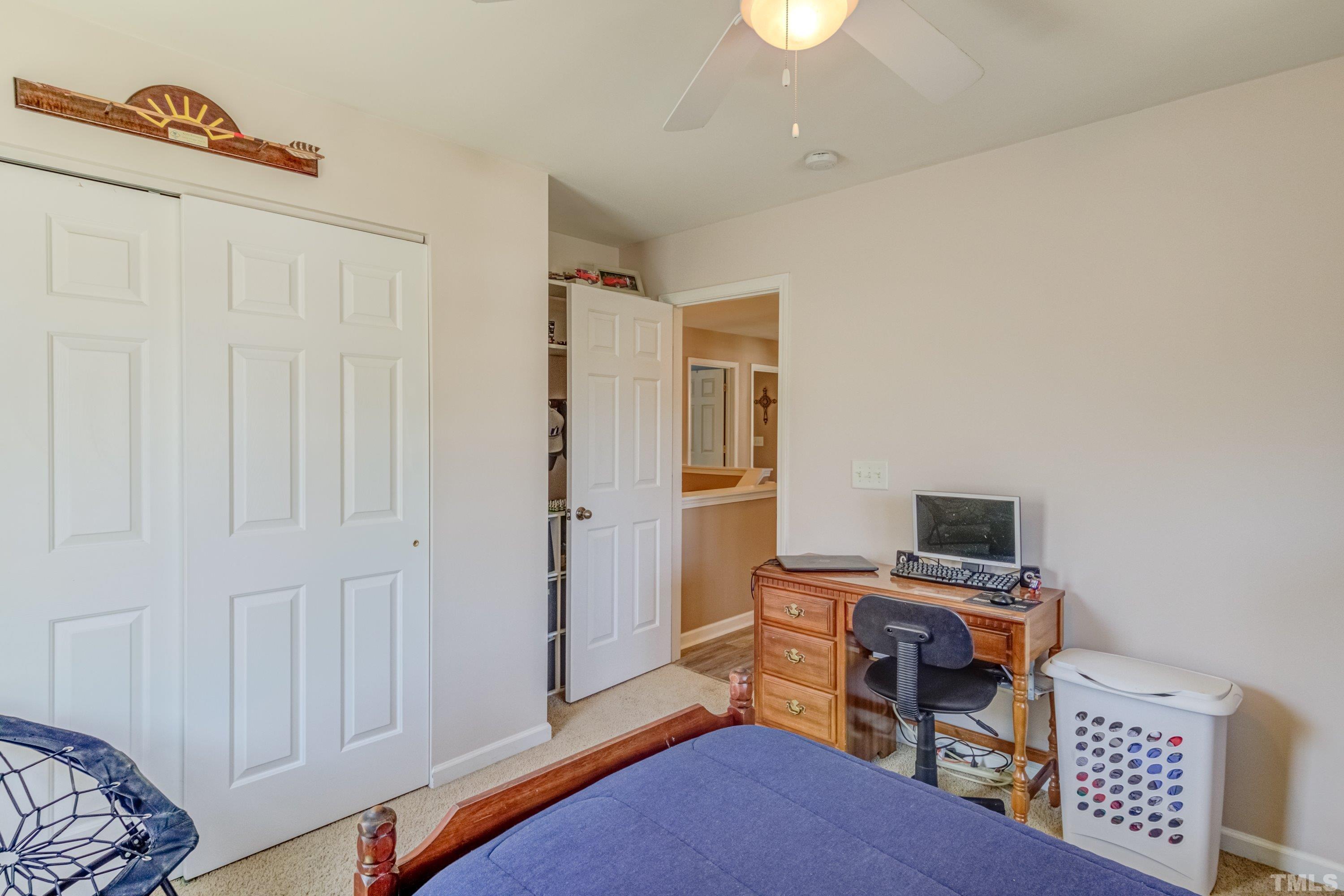 121 Ryder Cup Circle Raleigh, NC 27603 - Photo 31 of 43 a view of a workspace with furniture and a window