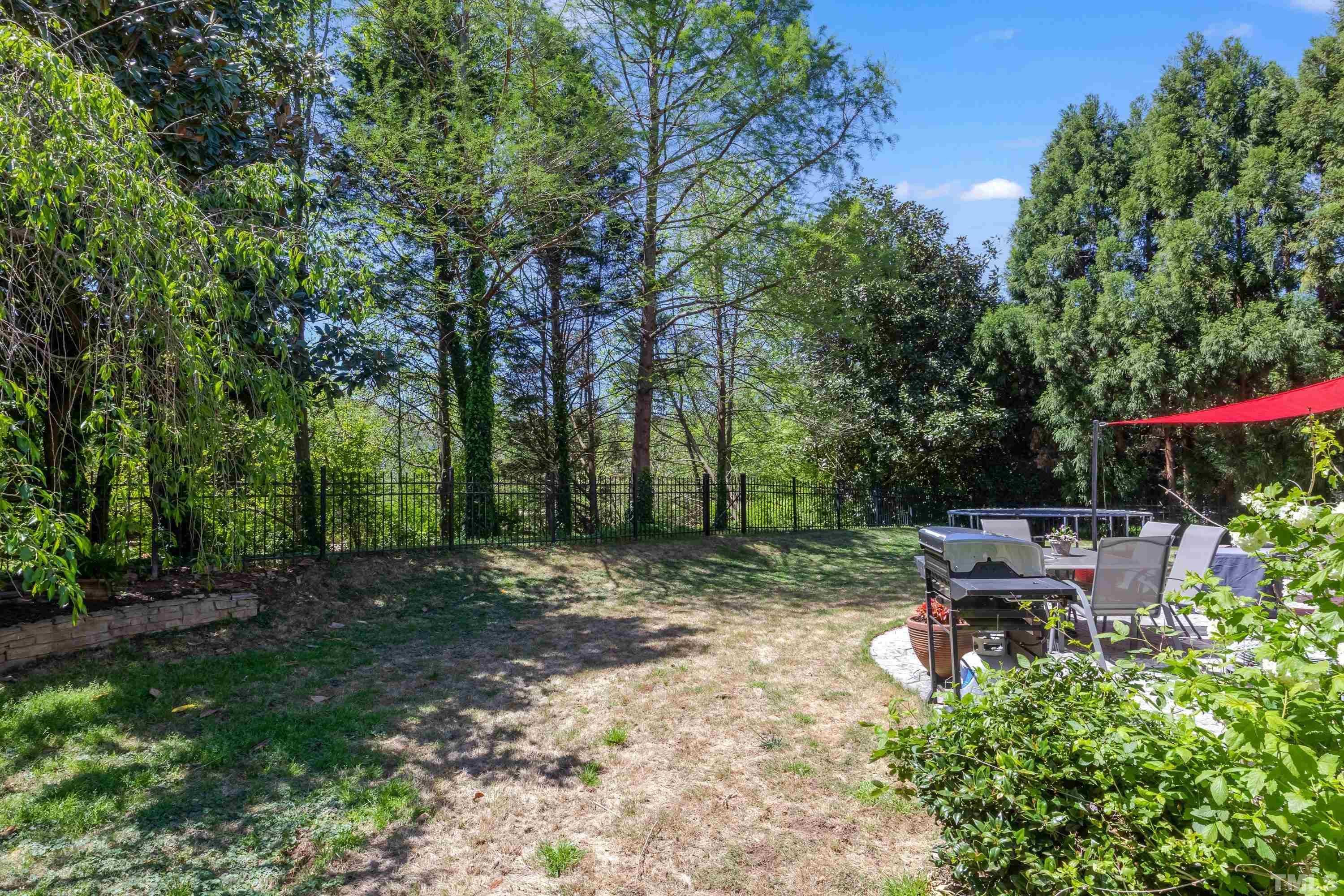 121 Ryder Cup Circle Raleigh, NC 27603 - Photo 38 of 43 a view of a back yard