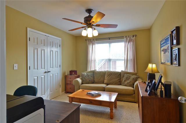 1224 White Rock Road Spring Hill, TN 37174 - Photo 13 of 15 a living room with furniture and a window
