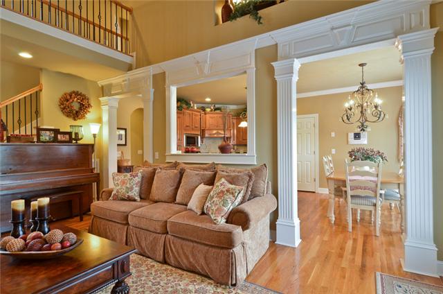 1224 White Rock Road Spring Hill, TN 37174 - Photo 15 of 15 a living room with furniture and wooden floor