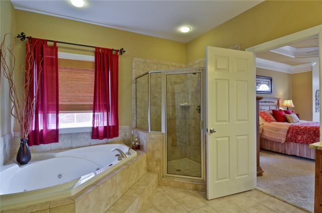 1224 White Rock Road Spring Hill, TN 37174 - Photo 6 of 15 a spacious bathroom with a tub shower and a sink