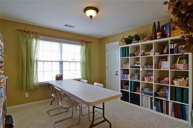 1224 White Rock Road Spring Hill, TN 37174 - Photo 10 of 15 a view of a workspace with furniture and a window