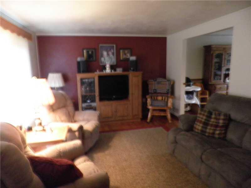 341 Crooks Road Apollo, PA 15613 - Photo 6 of 16 Living Room. SPACIOUS LIVING ROOM WITH WINDOW TREATMENTS AND HARDWOOD FLOORS.