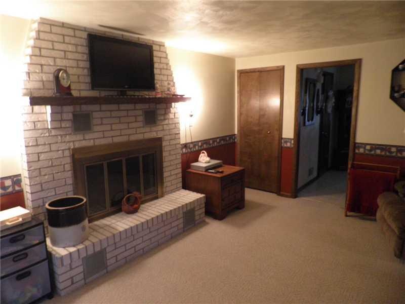 341 Crooks Road Apollo, PA 15613 - Photo 8 of 16 Family Room. FAMILYROOM WITH FUNCTIONAL FIREPLACE AND RAISED HEARTH, CURRENTLY USED WITH GAS LOGS.