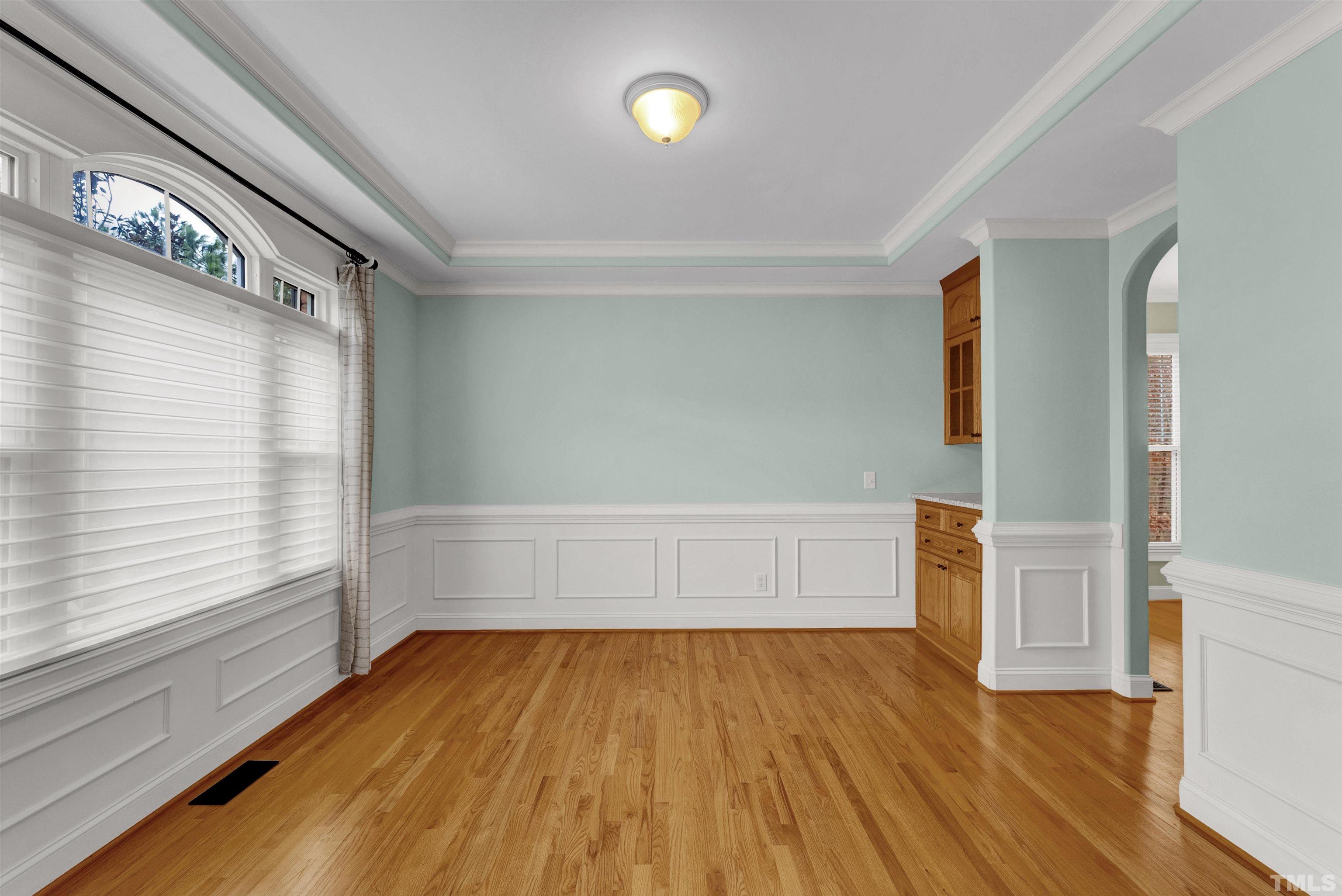 1201 Town Side Drive Apex, NC 27502 - Photo 16 of 40 wooden floor in an empty room with a window