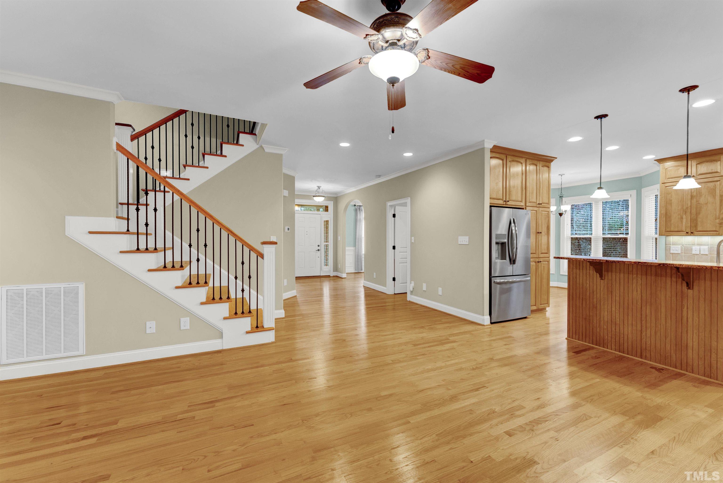 1201 Town Side Drive Apex, NC 27502 - Photo 2 of 40 a view of an entryway with wooden floor