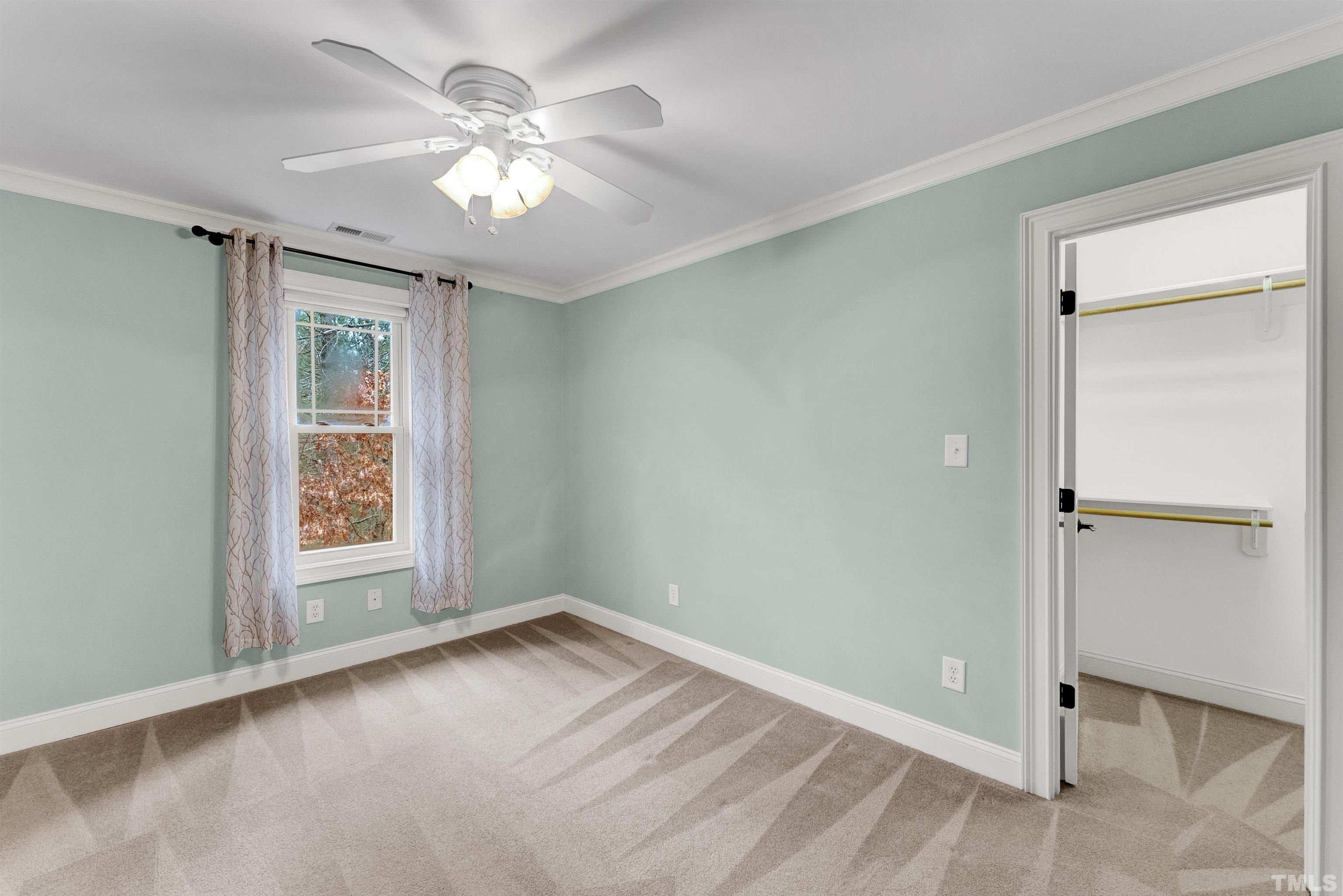 1201 Town Side Drive Apex, NC 27502 - Photo 27 of 40 a view of an empty room with a window