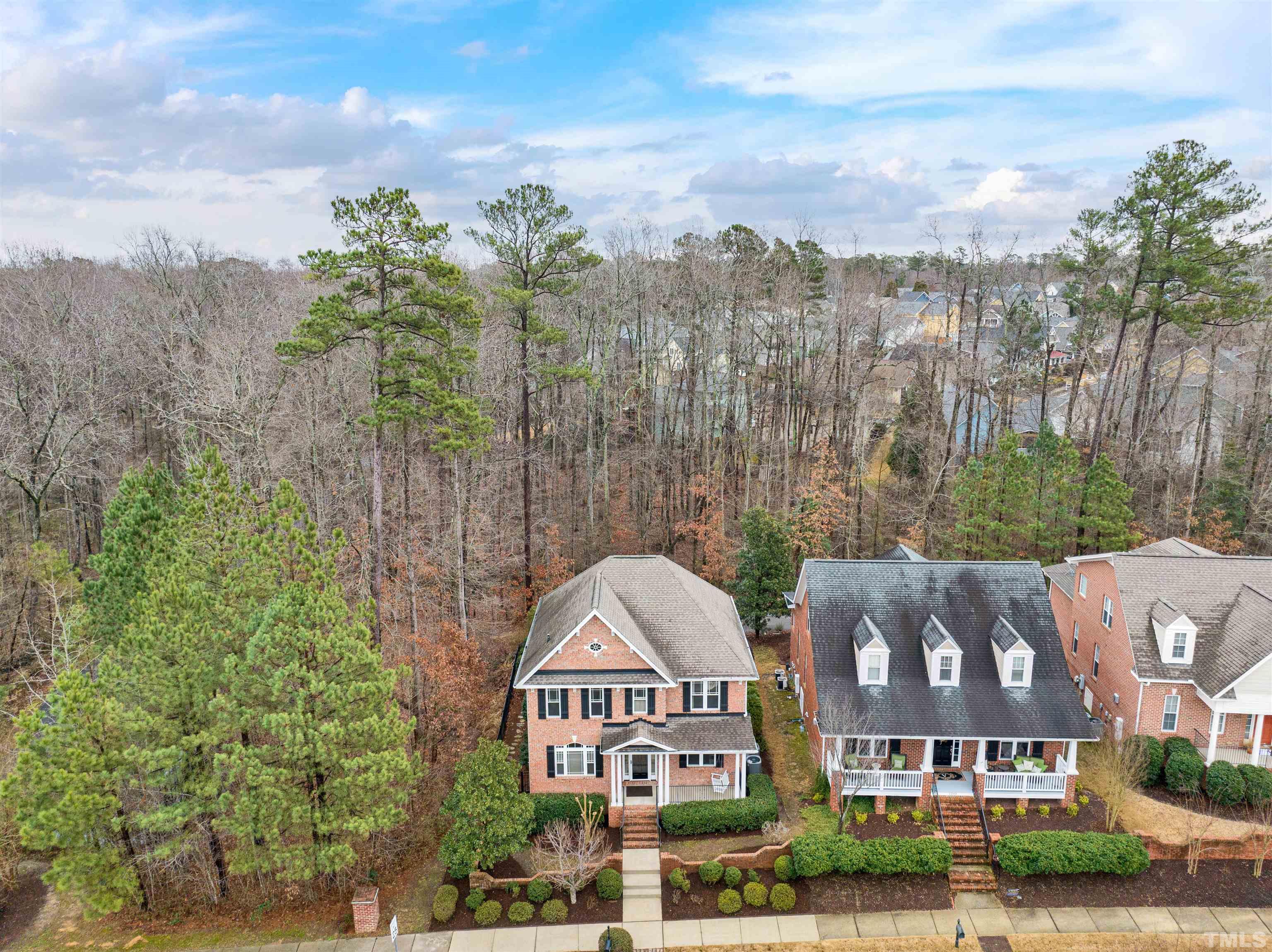 1201 Town Side Drive Apex, NC 27502 - Photo 37 of 40 a view of houses with a yard and outdoor seating
