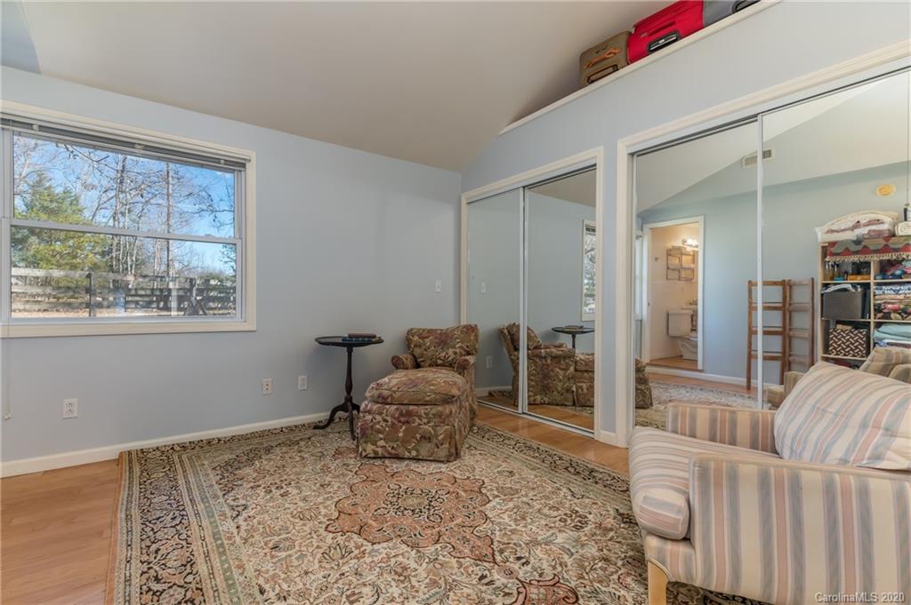 5975 Hunting Country Road Tryon, NC 28782 - Photo 26 of 47 a living room with furniture and a gate