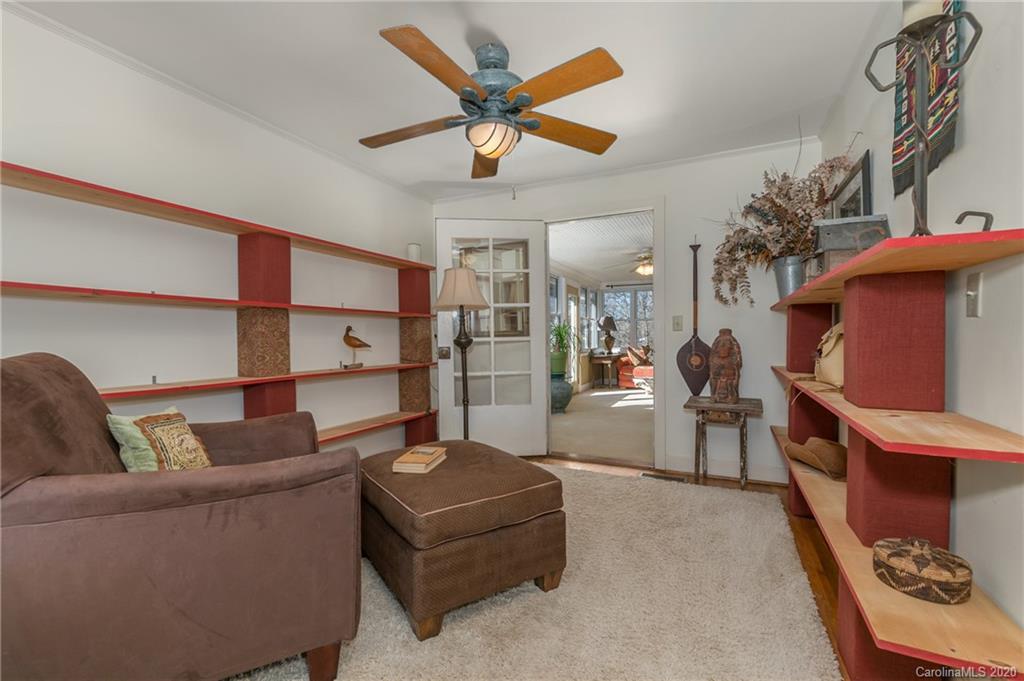 5975 Hunting Country Road Tryon, NC 28782 - Photo 37 of 47 a living room with furniture and a ceiling fan
