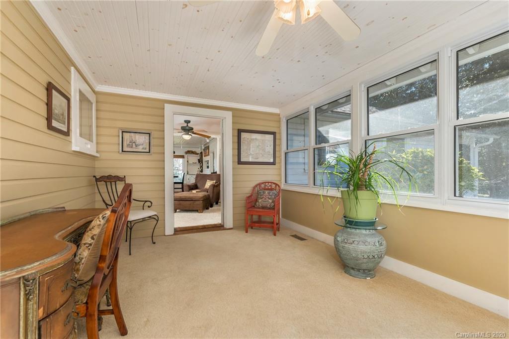 5975 Hunting Country Road Tryon, NC 28782 - Photo 39 of 47 a dining room with furniture and a window