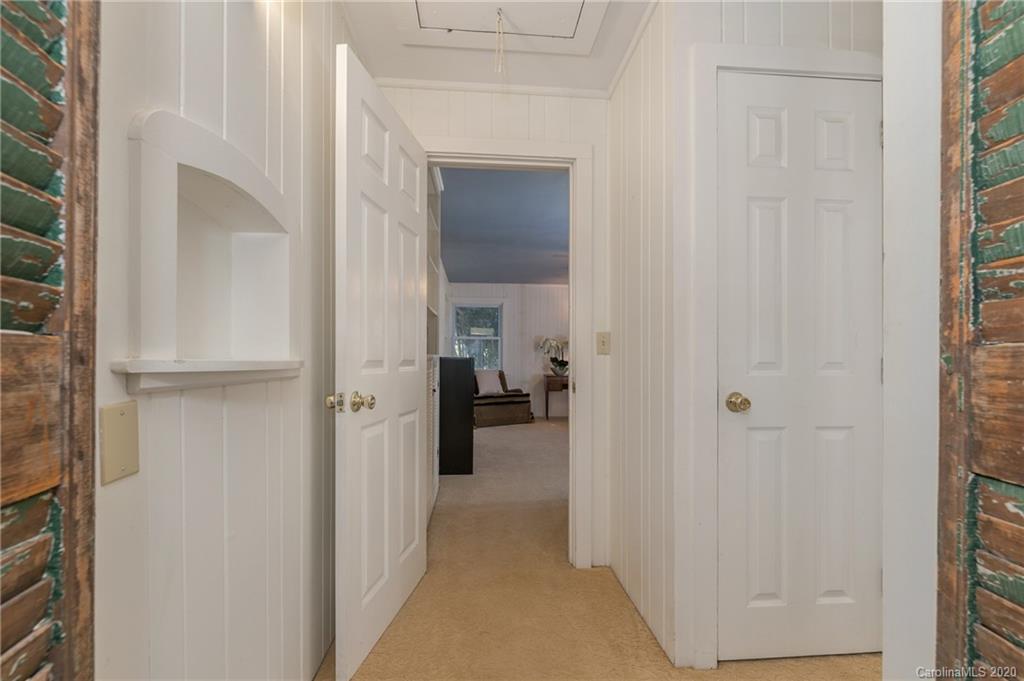 5975 Hunting Country Road Tryon, NC 28782 - Photo 41 of 47 a view of a livingroom from a hallway