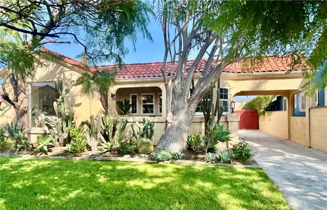 a view of front door of house with yard