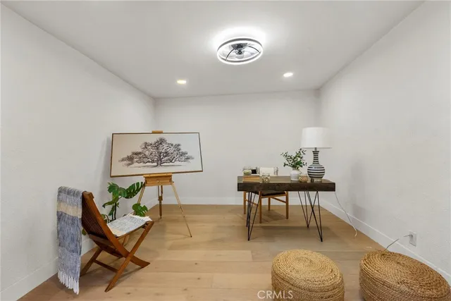 a view of a livingroom with furniture and a couch