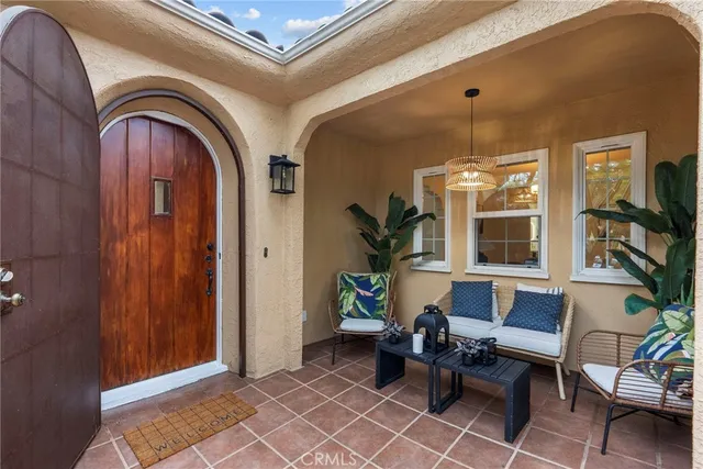 a living room with furniture and window