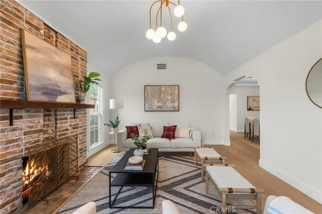 a work room with furniture and wooden floor