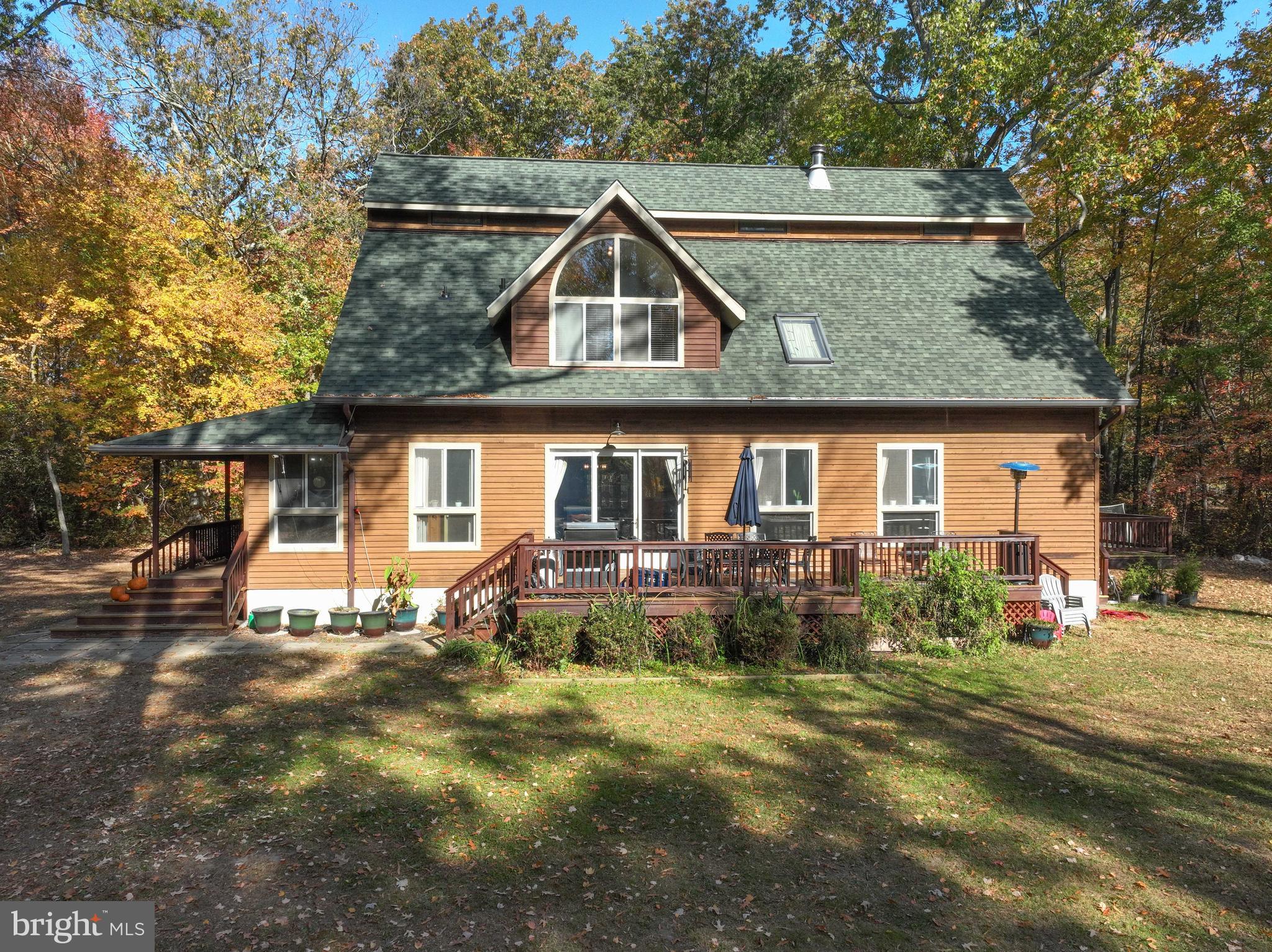 4921 Idlewilde Road Shady Side, MD 20764 - Photo 15 of 58 Cedar-Sided Home with 3 Decks & Walls of Windows
