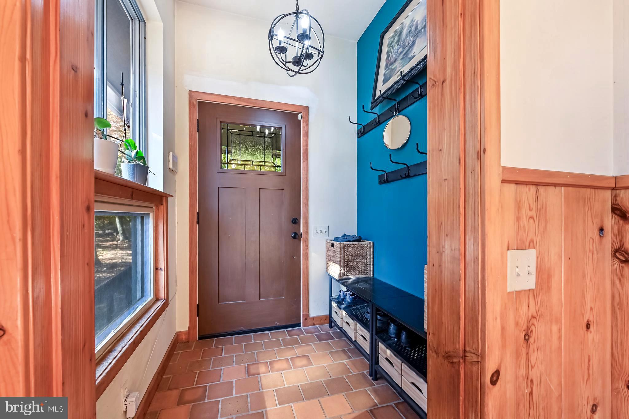 4921 Idlewilde Road Shady Side, MD 20764 - Photo 18 of 58 Tiled Foyer w/Coat Hangers & Bench Floor Storage