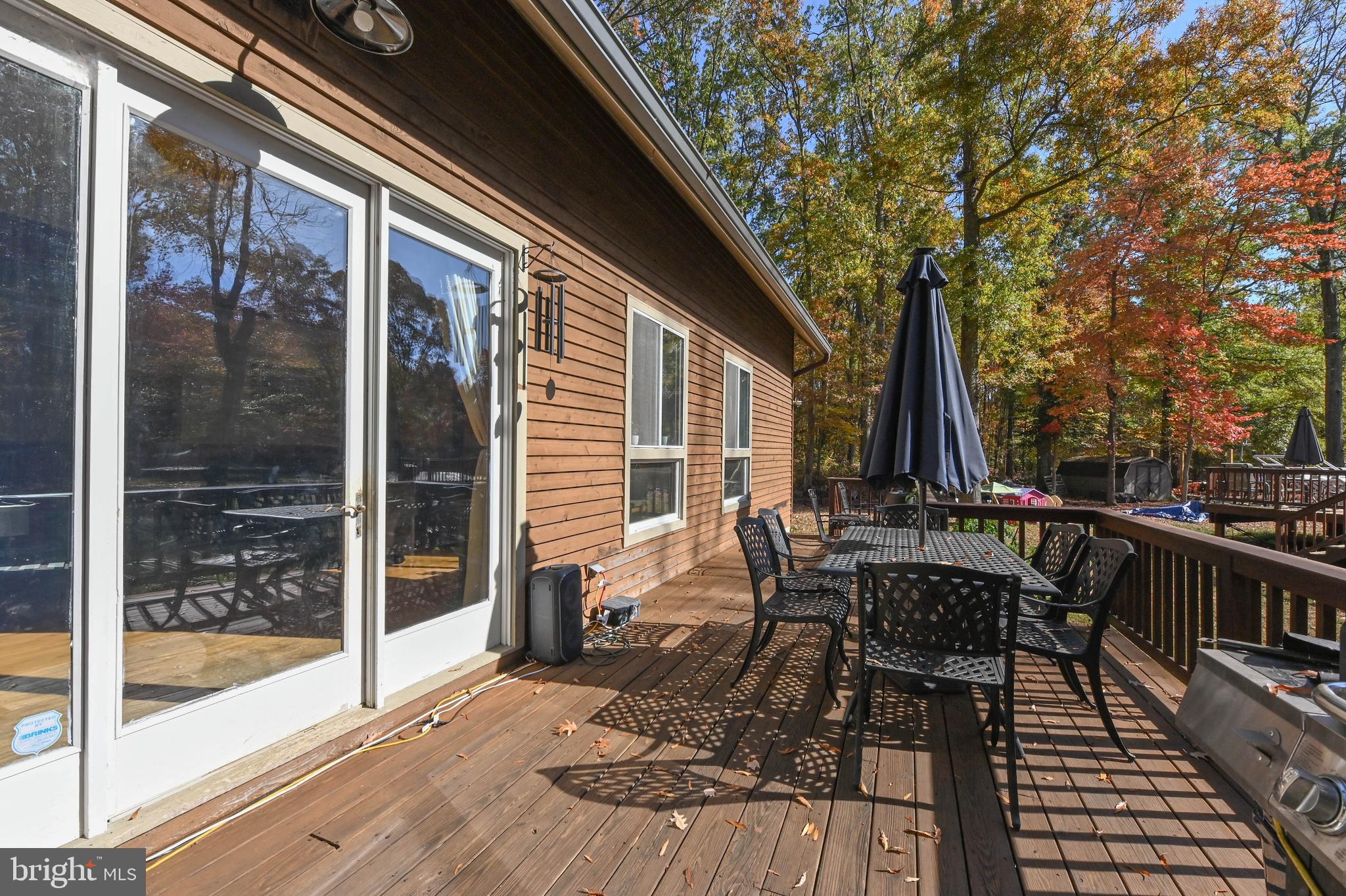 4921 Idlewilde Road Shady Side, MD 20764 - Photo 22 of 58 Wall of Glass Opening to Dining/Entertaining Deck