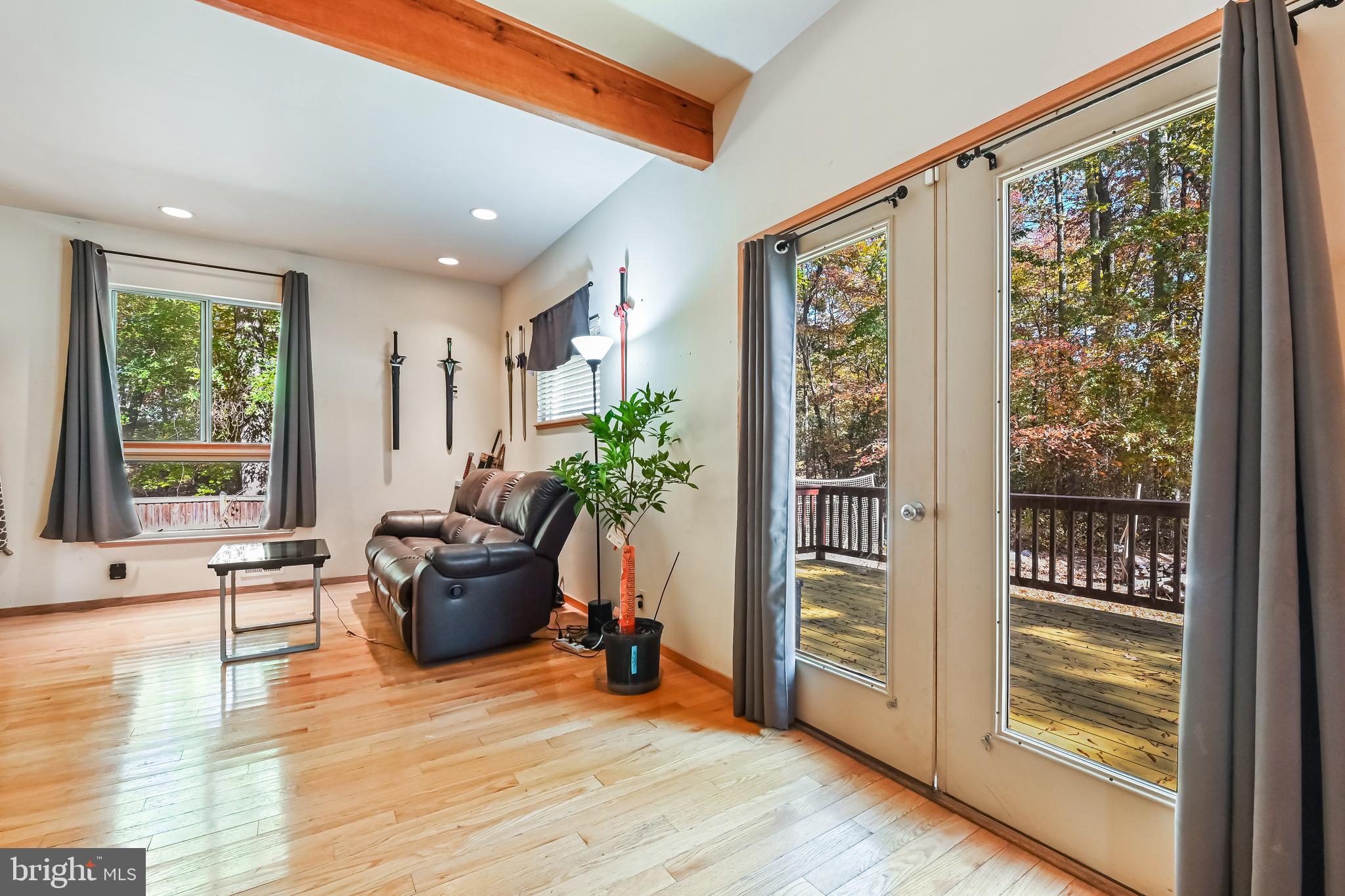 4921 Idlewilde Road Shady Side, MD 20764 - Photo 31 of 58 Glass Door Spilling Out to Back Deck