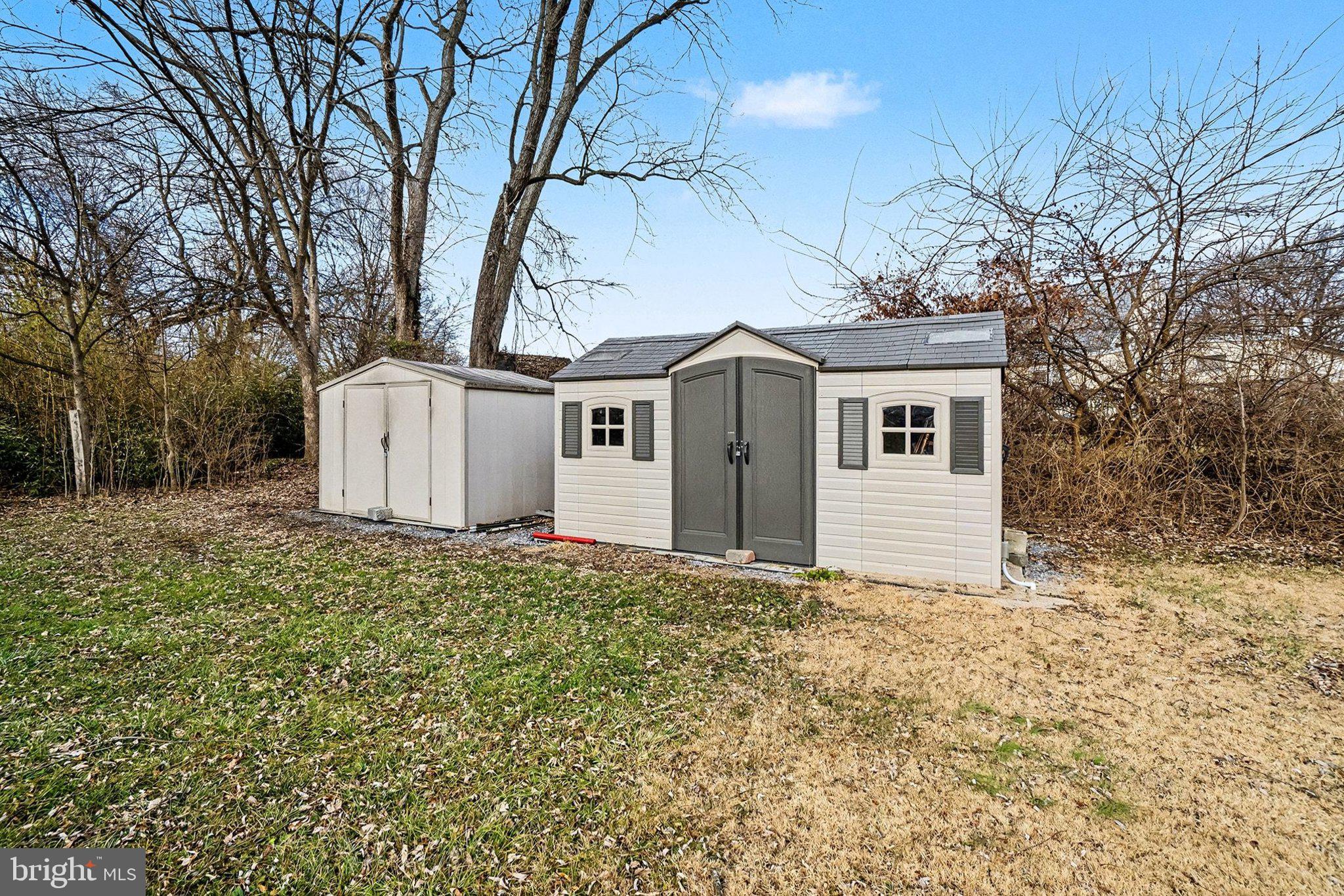 6216 Locust Street Harrisburg, PA 17112 - Photo 20 of 28 a white house that has a tree in front of it