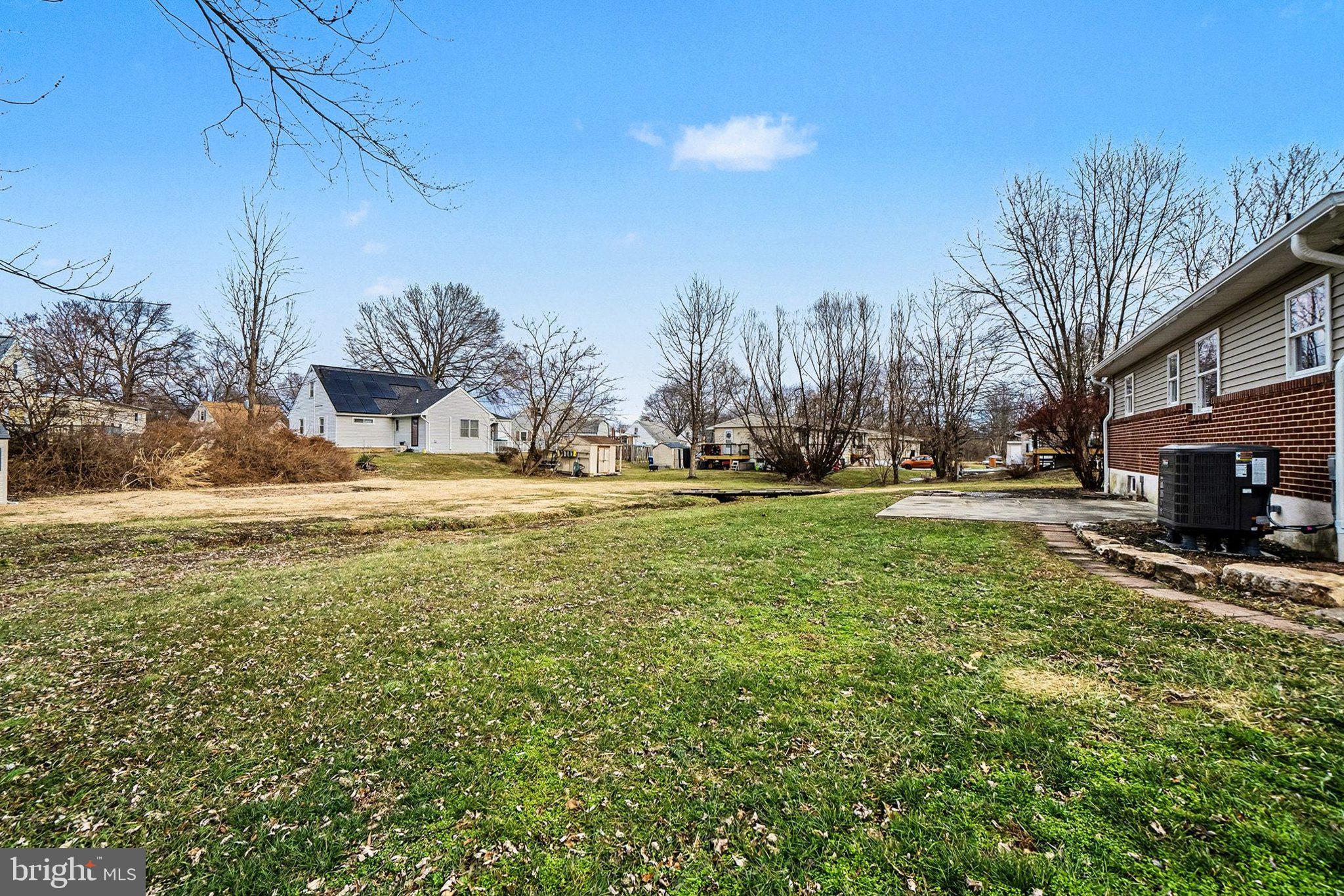 6216 Locust Street Harrisburg, PA 17112 - Photo 22 of 28 a view of outdoor space with garden and trees