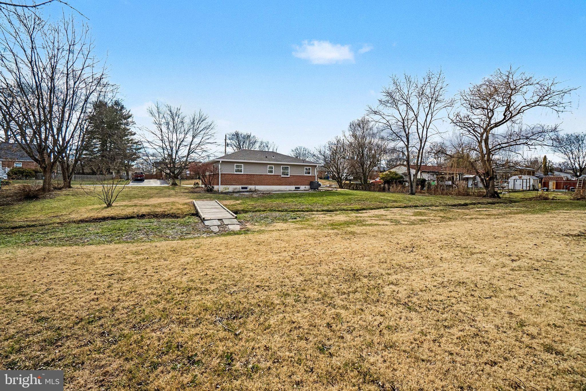 6216 Locust Street Harrisburg, PA 17112 - Photo 25 of 28 a view of a yard with a house